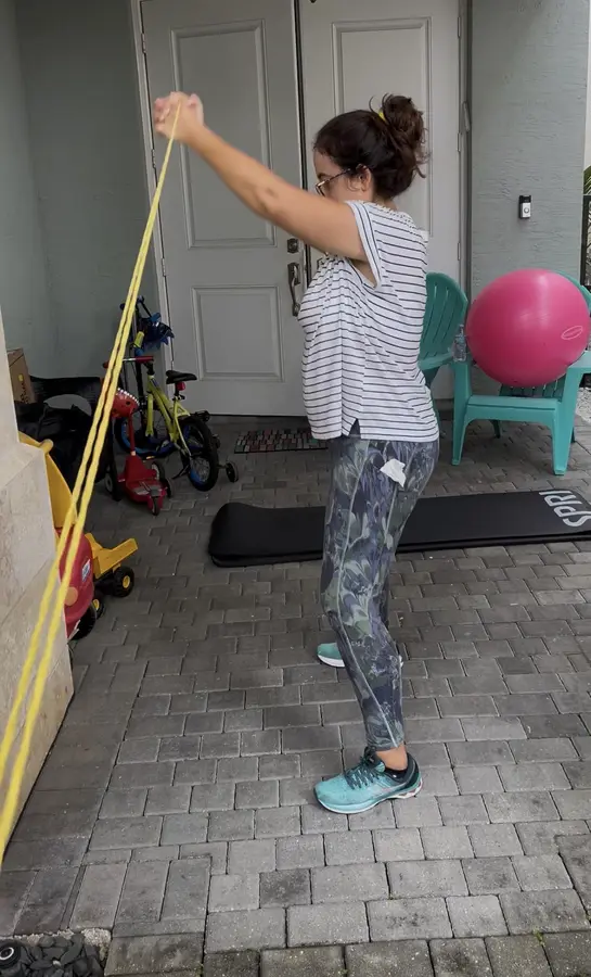 Resistance-band strength training in a home workout space