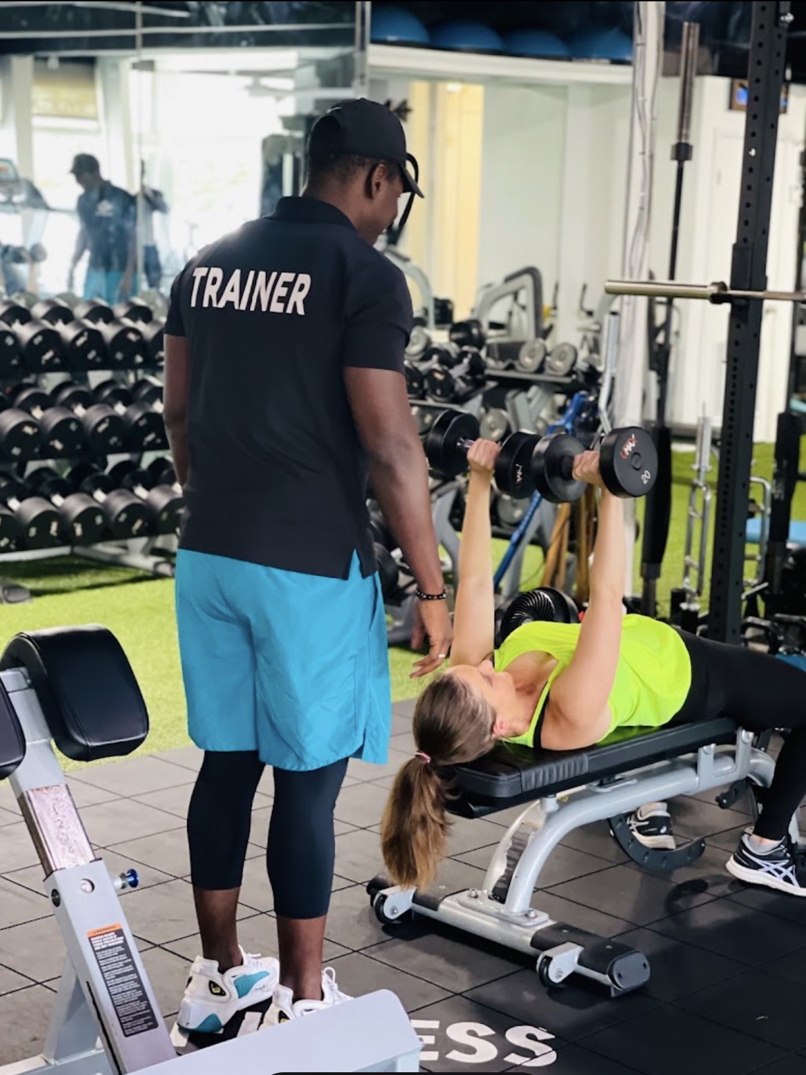 Coach Rodney Pierre coaching a client during private strength training