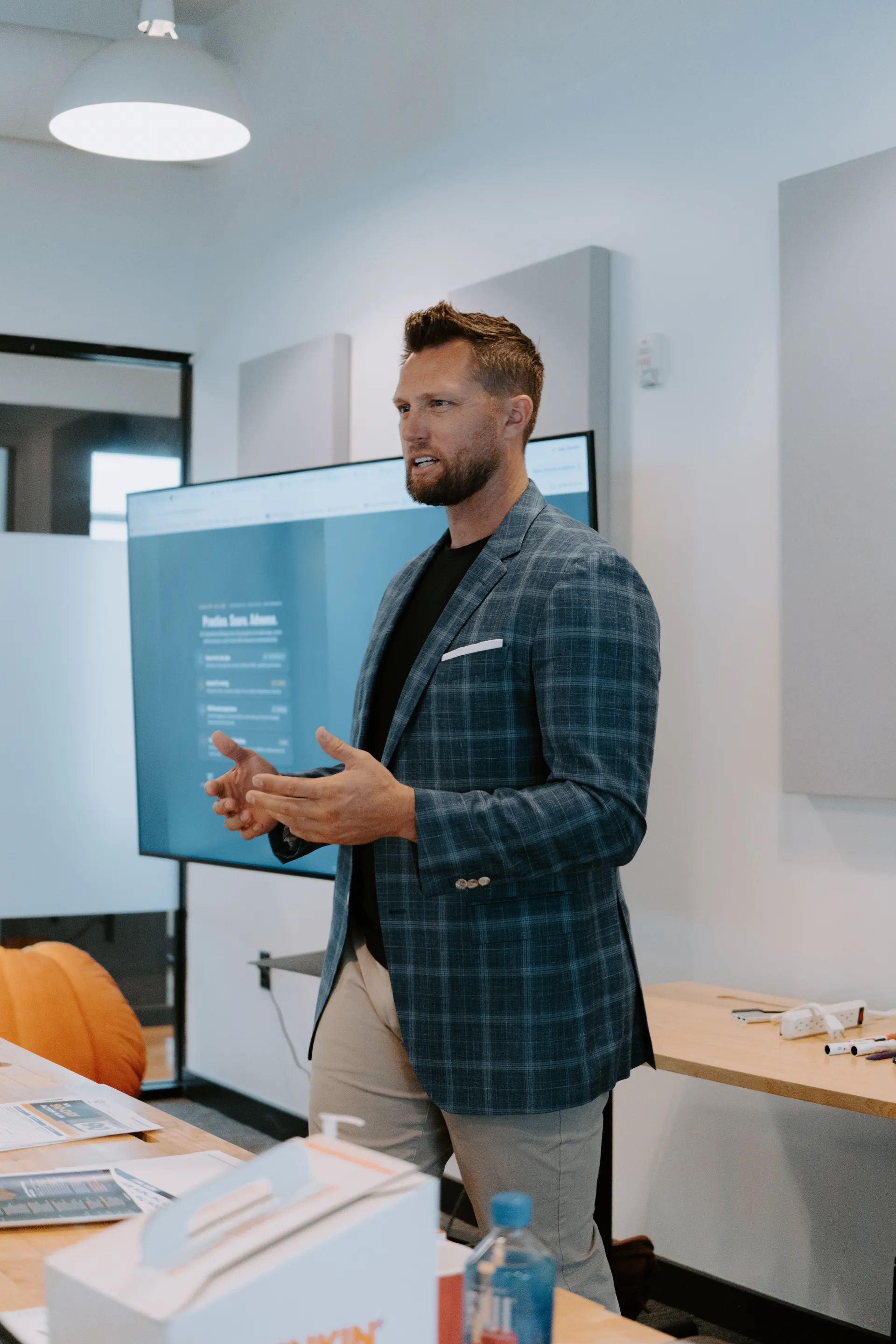 Ryan G. speaking in a business setting