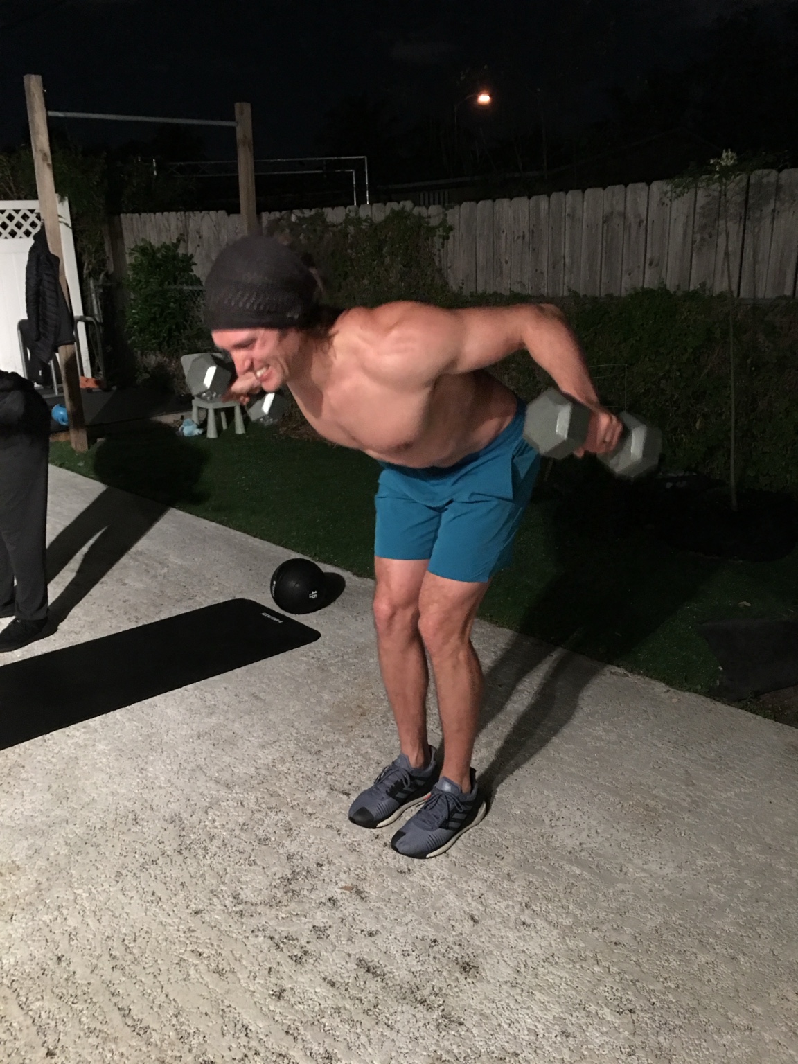 Ryan G. training with dumbbells
